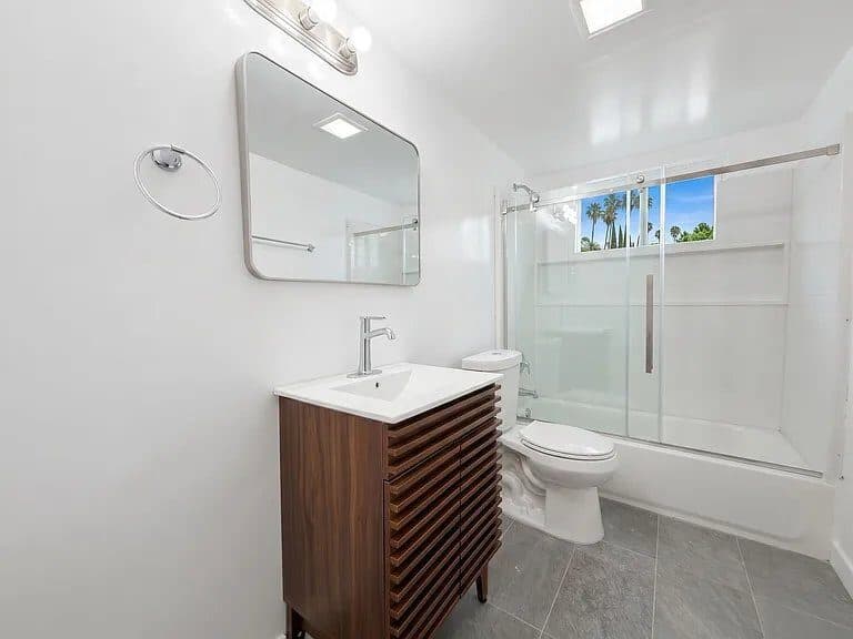 Bathroom with walnut vanity